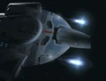 USS Defiant firing quantum torpedoes.jpg