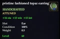 Fashioned topaz earring.jpg