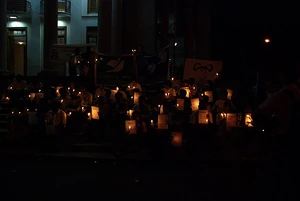 Candle in darkness