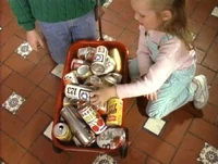 Girl-recycles-cans.jpg