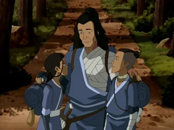 Katara, Sokka, and Bato hug