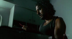 4x03 SayidHoldingAPassport