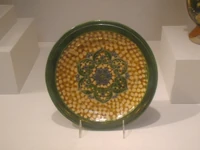 Earthenware dish with sancai glaze and rosette medallion, Tang Dynasty