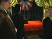 Draco Malfoy and Severus Snape at Slughorn christmas party