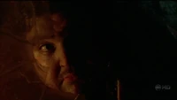 4x01 TBOTE Hurley peek-a-boo.jpg