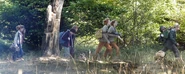 The Weasleys with Harry Potter and Hermione travelling to get to the Portkey