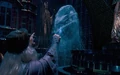 Dumbledore covering Voldemort in the water.jpg