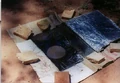 Hole in the ground box cooker built by Kristen Rahn.jpg