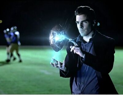 SuperbowlCommercialSylarPopstheFootball