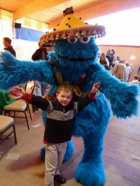 Cookiemonsterandkidposeatsesamestreetsafarioffun