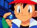 EP007 Ash con la medalla Cascada