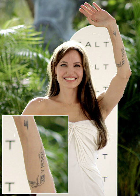 FileAngelina Jolie adds two new swirl tattoos to Roman numeral on left arm