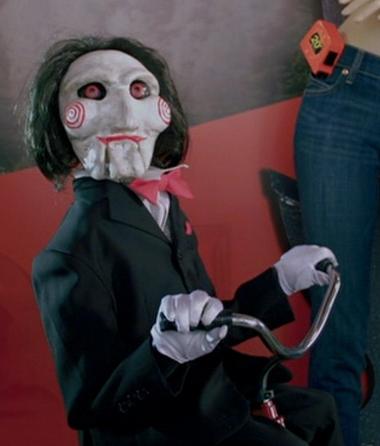 http://images2.wikia.nocookie.net/__cb20110227131429/sawfilms/images/9/95/Billy_the_puppet_SAW3D.jpg