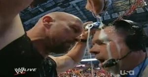 Steve Austin becomes special guest referee for the Cole vs Lawler match at WrestleMania 27 and wets Cole's pants with beer.