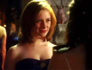 Holly J & Fiona Looking At Eachother In Dresses