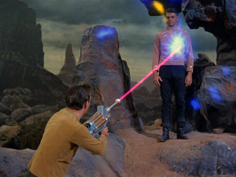 800px-Kirk_fires_a_phaser_rifle_at_Mitchell.jpg