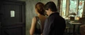 Harry zipping up Ginny's dress.JPG