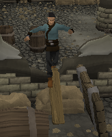 Climbing over low wall