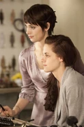 Alice and bella getting ready for the wedding.