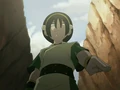Toph pointing down.png
