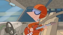 Phineas playing guitar while racing