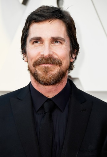 Christian Bale Flexing