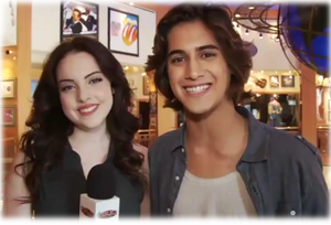 Elizabeth and Avan getting interviewed