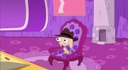 Agent Pinky sitting in chair