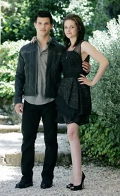Taylor-Lautner-and-Kristen-Stewart-in-a-Stunning-Black-Cocktail-Dress-for-Twight-Eclipse-Photo-Call feature article horizontal