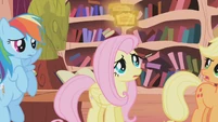 Fluttershy looking at the tickets S01E03