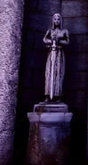 Statue holding sword pointing DOWN
