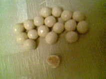 White maltesers with one thats halfffffeed