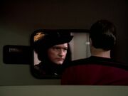 Riker watched footage of Q's visit