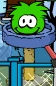Green puffle playing with furniture