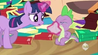 Twilight Sparkle wiping Spike's face S2E21