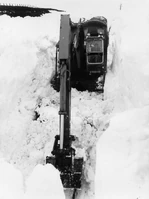 HY-MAC CLEARING SNOW FROM RAIL LINES IN PERTH SCOTLAND.