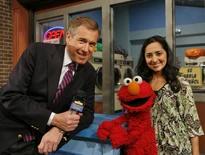 Leela, Brian Williams and Elmo