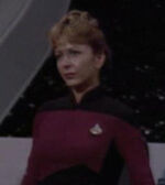 Female command officer at poetry reading