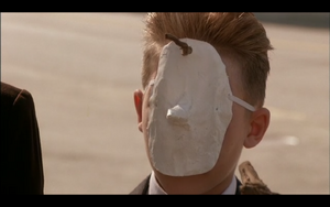 Pierre w- mask outside the diner