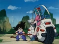 Goku looking at Bulma's Bike