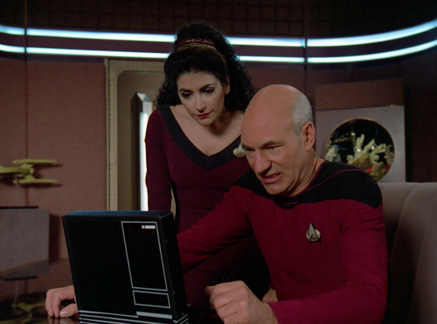 Troi_and_Picard_read_Hotel_Royale.jpg