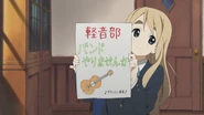 Mugi with poster
