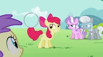 Apple Bloom holds the hoop with the tip of her tail S2E06