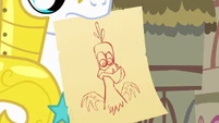Guard showing what Philomena looks like S1E22