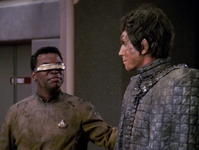 Bochra and La Forge covered in mud