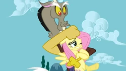 Discord holding Fluttershy S3E10