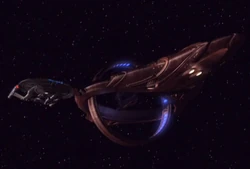 Dkyr docked with Enterprise