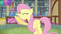Fluttershy blowing knotted party horn S03E13