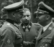 Himmler at an autograph session with fan and Fegelein