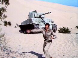 The Moon and the Desert - Steve throwing grenade